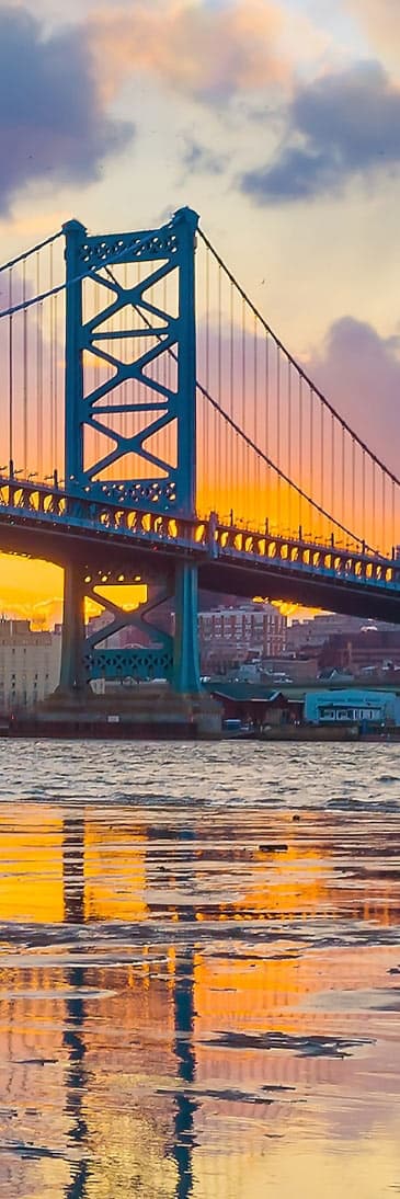 Benjamin Franklin bridge over icy Delaware River